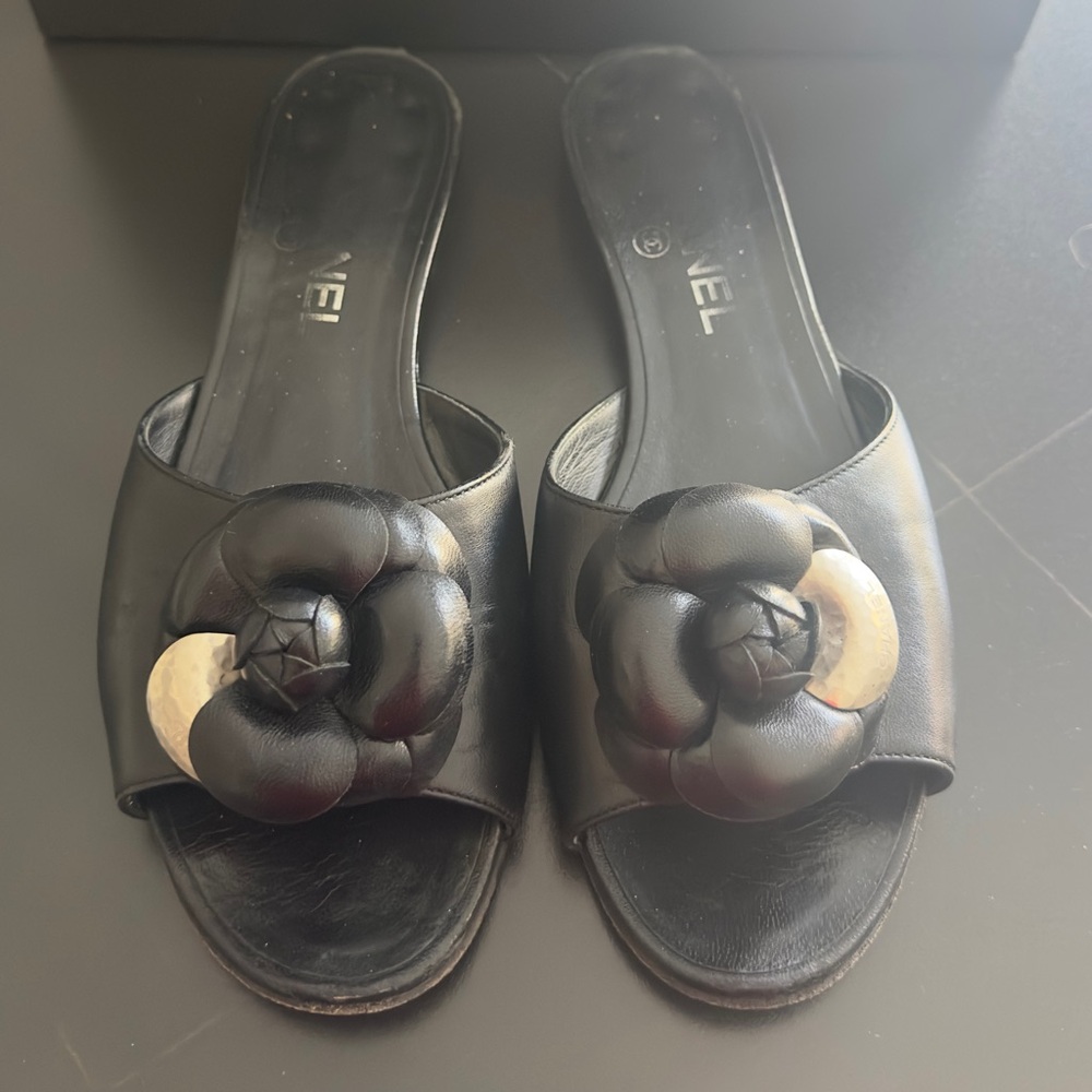 CHANEL Black Leather and Metal Camelia Mules